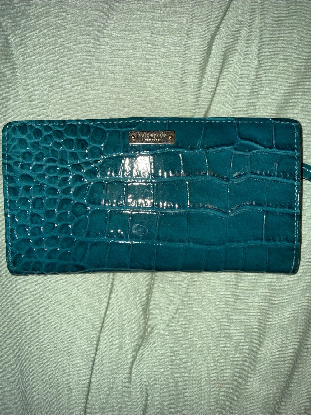 Kate Spade teal/green croc-embossed wallet with zipper
